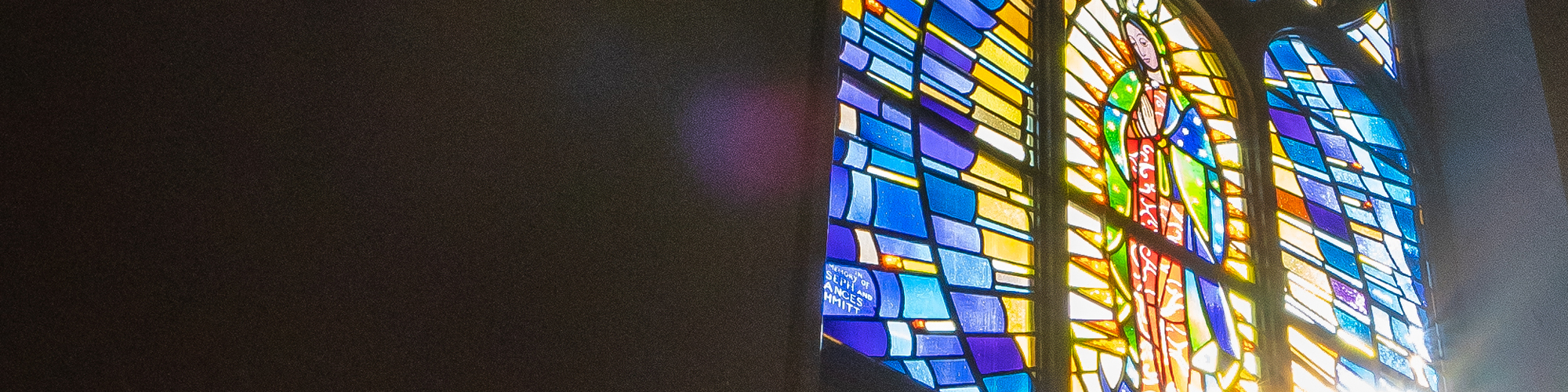 Light shining through a stained glass window